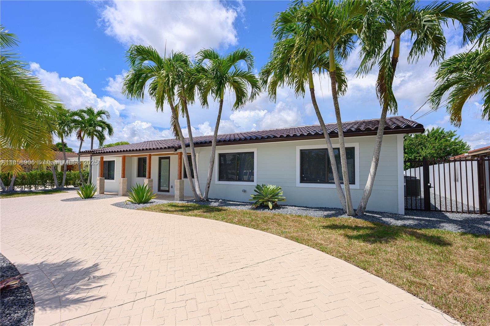 11835 Southwest 37th Street Miami, FL 33175 - Photo 4 of 47 a front view of house with yard and trees