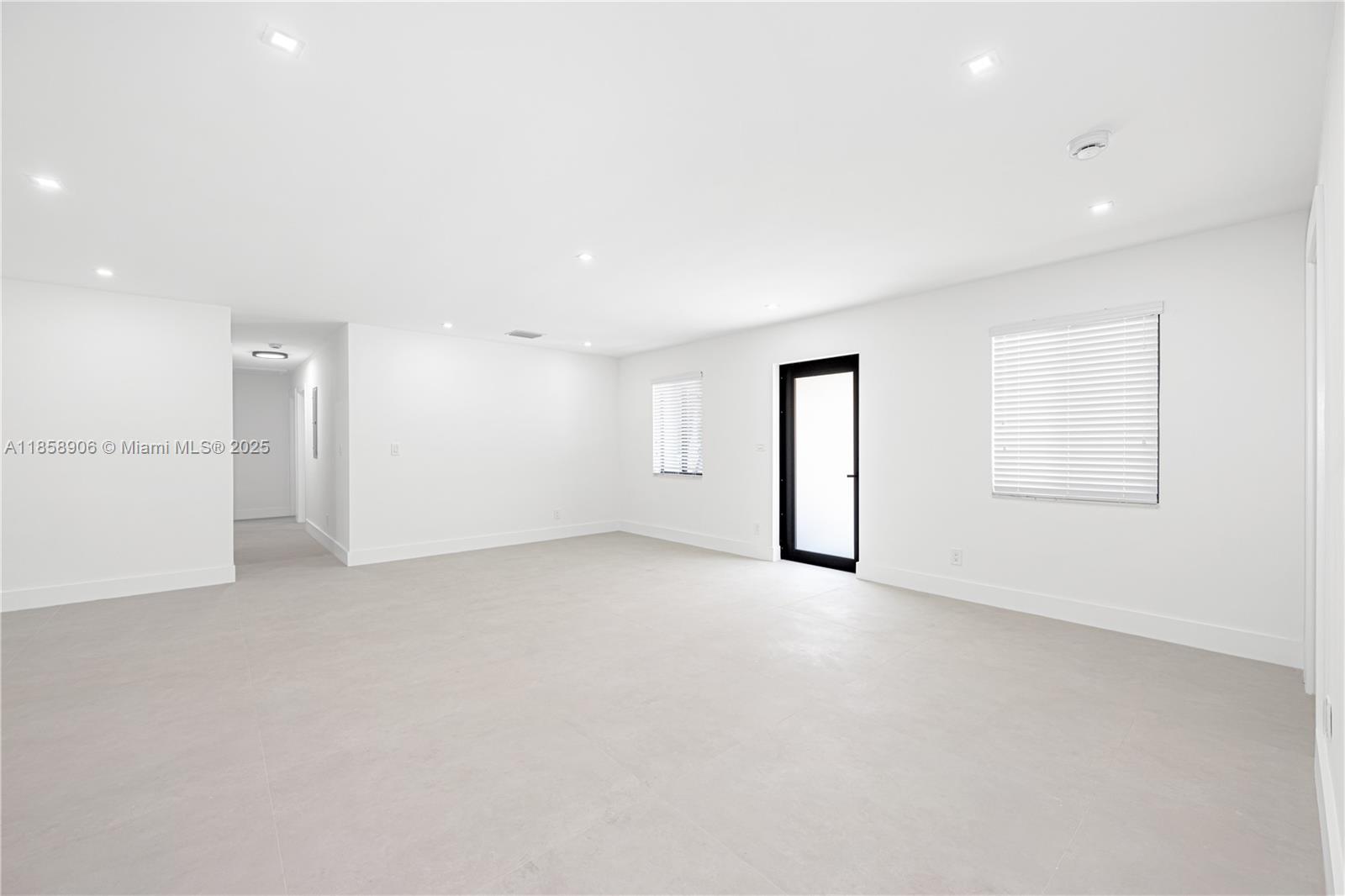 11835 Southwest 37th Street Miami, FL 33175 - Photo 6 of 47 an empty room with a empty space and windows