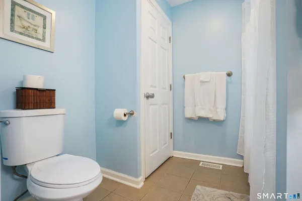 a bathroom with a toilet