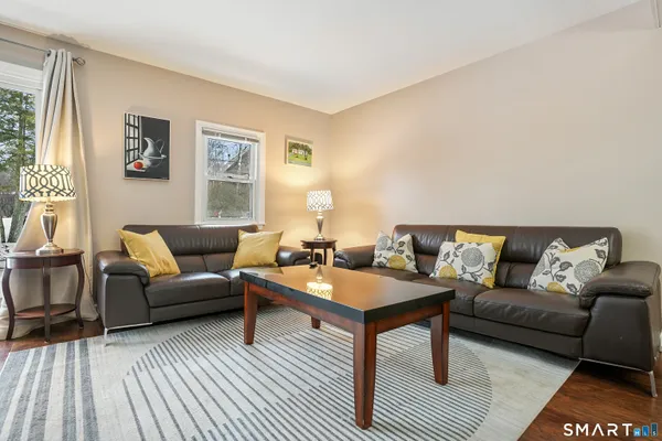a living room with furniture and a couch