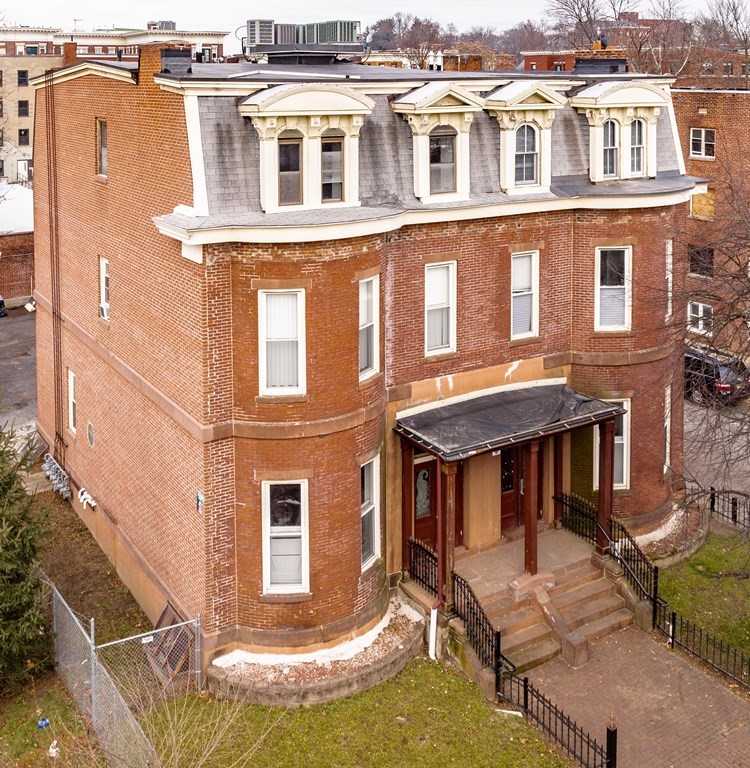 238-240 Union Street Springfield, MA 01105 - Photo 1 of 17 a view of a building with a barbeque grill and plants