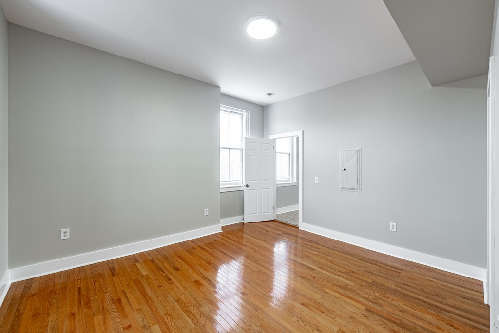 238-240 Union Street Springfield, MA 01105 - Photo 15 of 17 a view of empty room with wooden floor