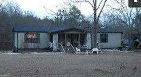 a front view of house with seating space