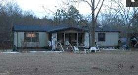 443 Old Bush Mill Road Bremen, GA 30110 - Photo 1 of 3 a front view of house with seating space
