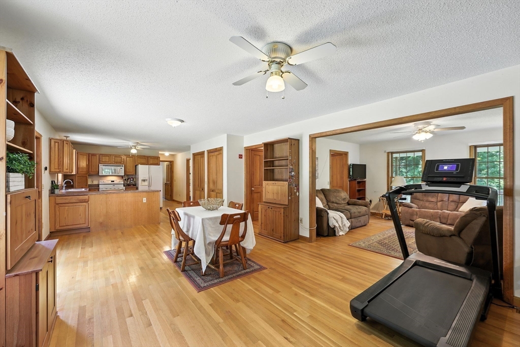 285 Lower Hampden Road Monson, MA 01057 - Photo 13 of 40 a living room with furniture and a wooden floor