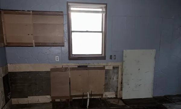an empty room with windows