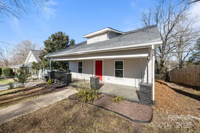 a front view of a house with a patio