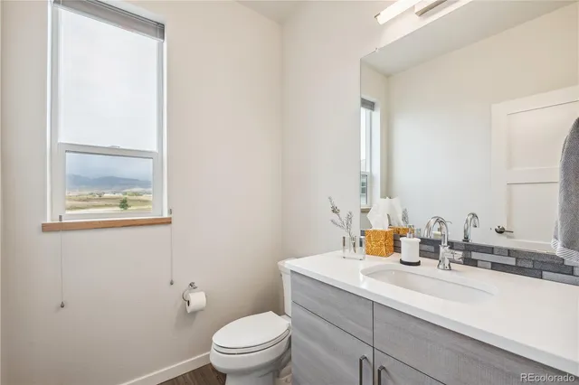 a white bath tub sitting next to a white tub