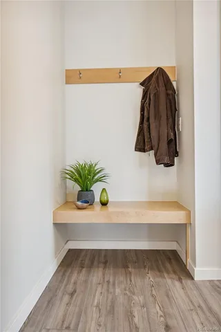 a bedroom with a bed and a ceiling fan