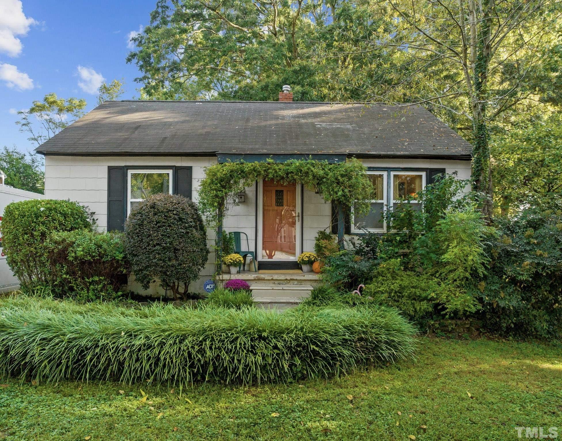 2615 Layden Street Raleigh, NC 27603 - Photo 1 of 34 a front view of house with yard and green space