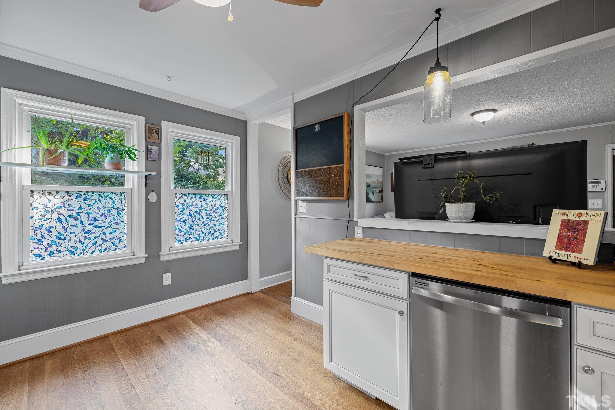 2615 Layden Street Raleigh, NC 27603 - Photo 12 of 34 a view of a kitchen with a sink and a large window