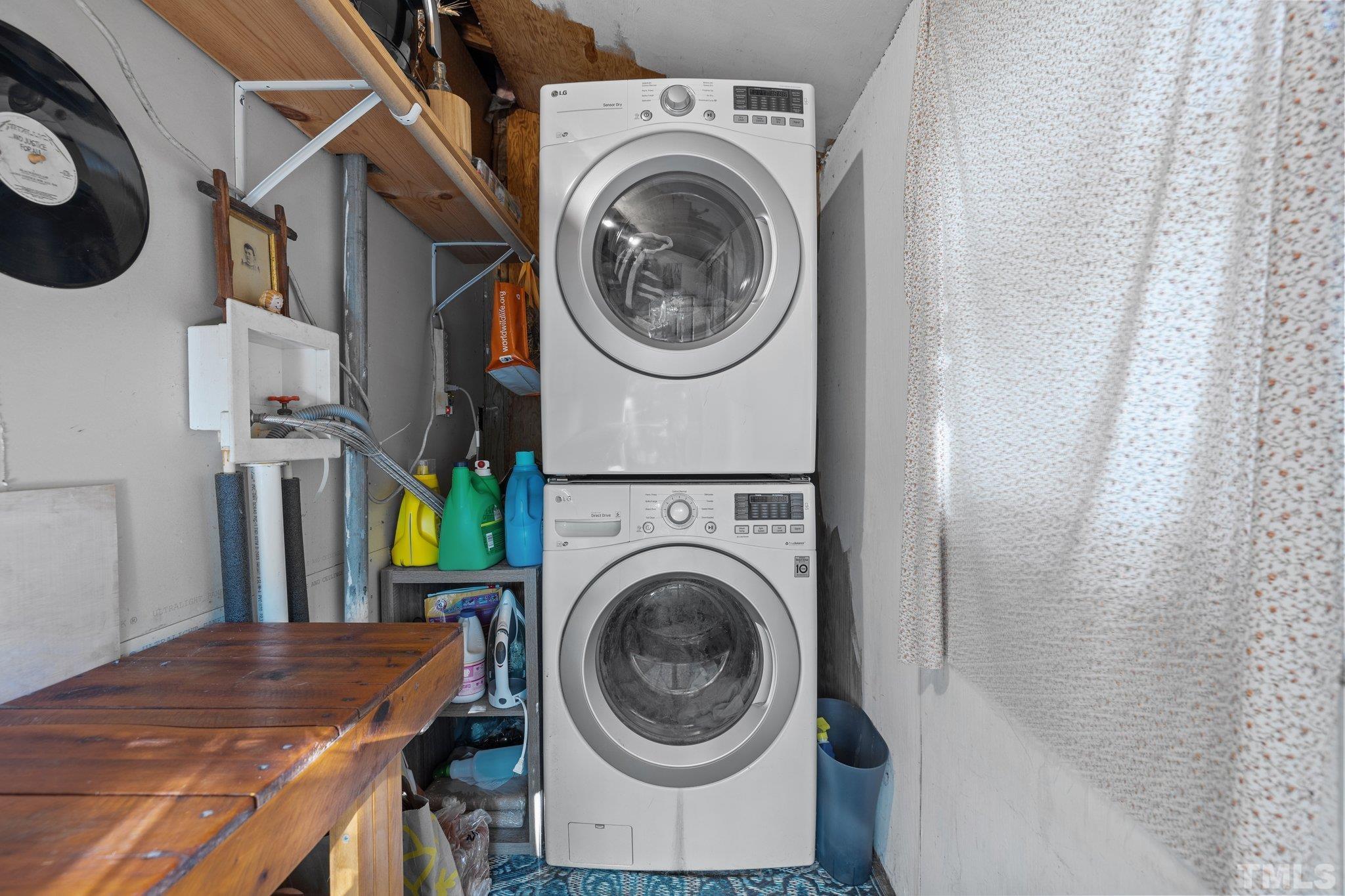 2615 Layden Street Raleigh, NC 27603 - Photo 13 of 34 a utility room with dryer and washer