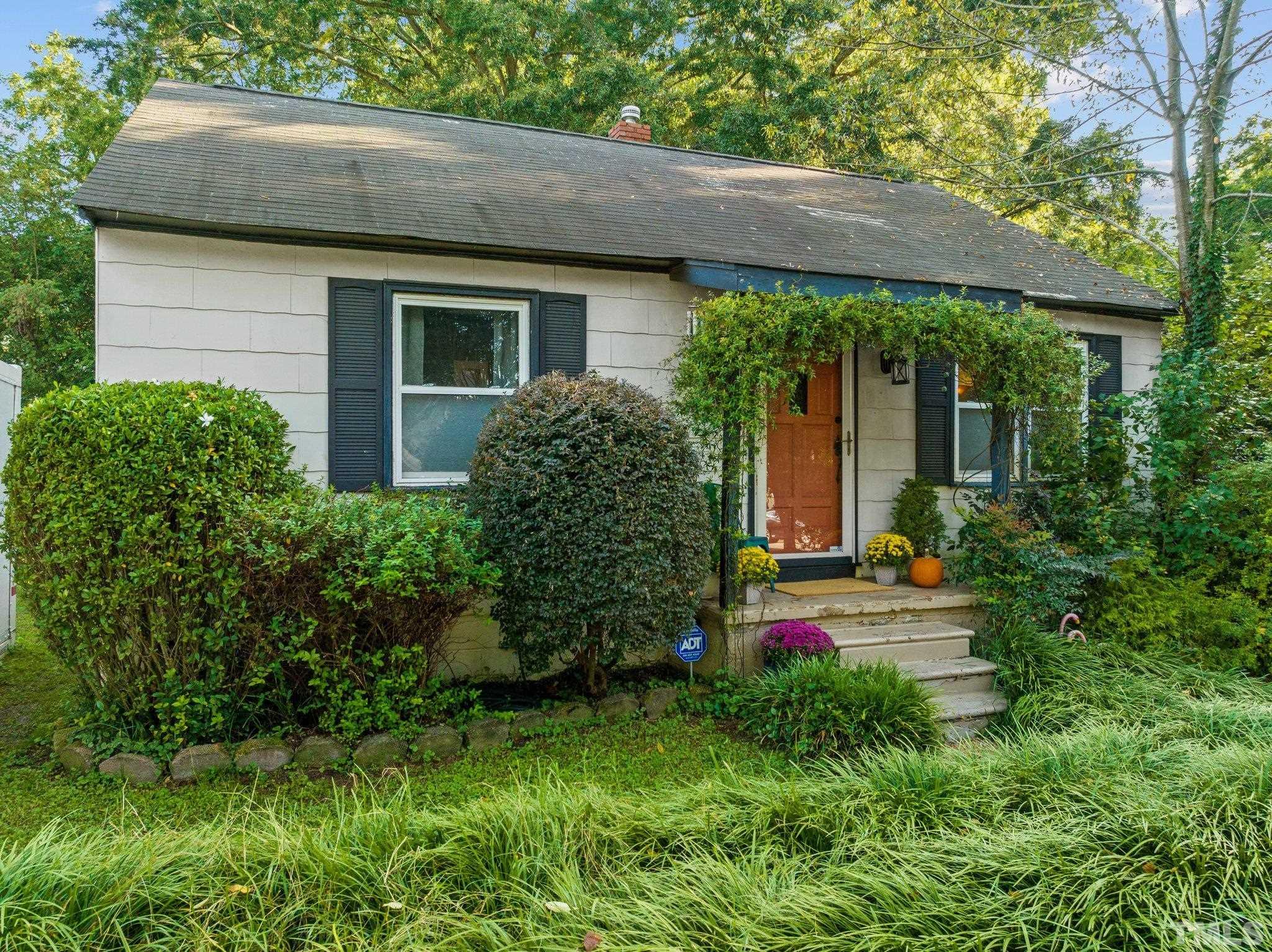 2615 Layden Street Raleigh, NC 27603 - Photo 2 of 34 front view of house with a yard