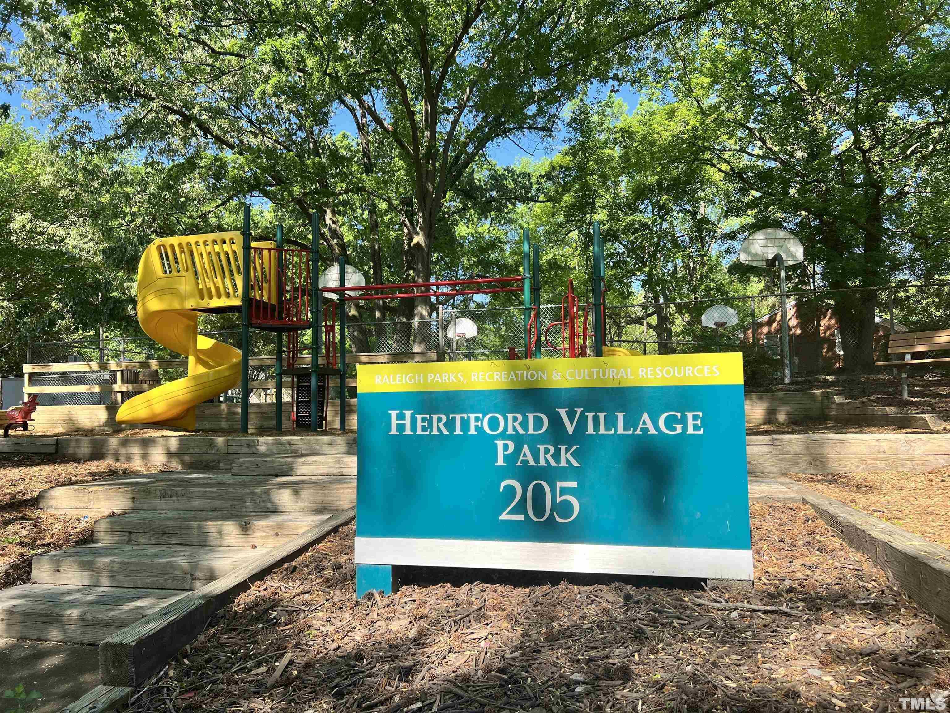 2615 Layden Street Raleigh, NC 27603 - Photo 30 of 34 a sign on the side of a road