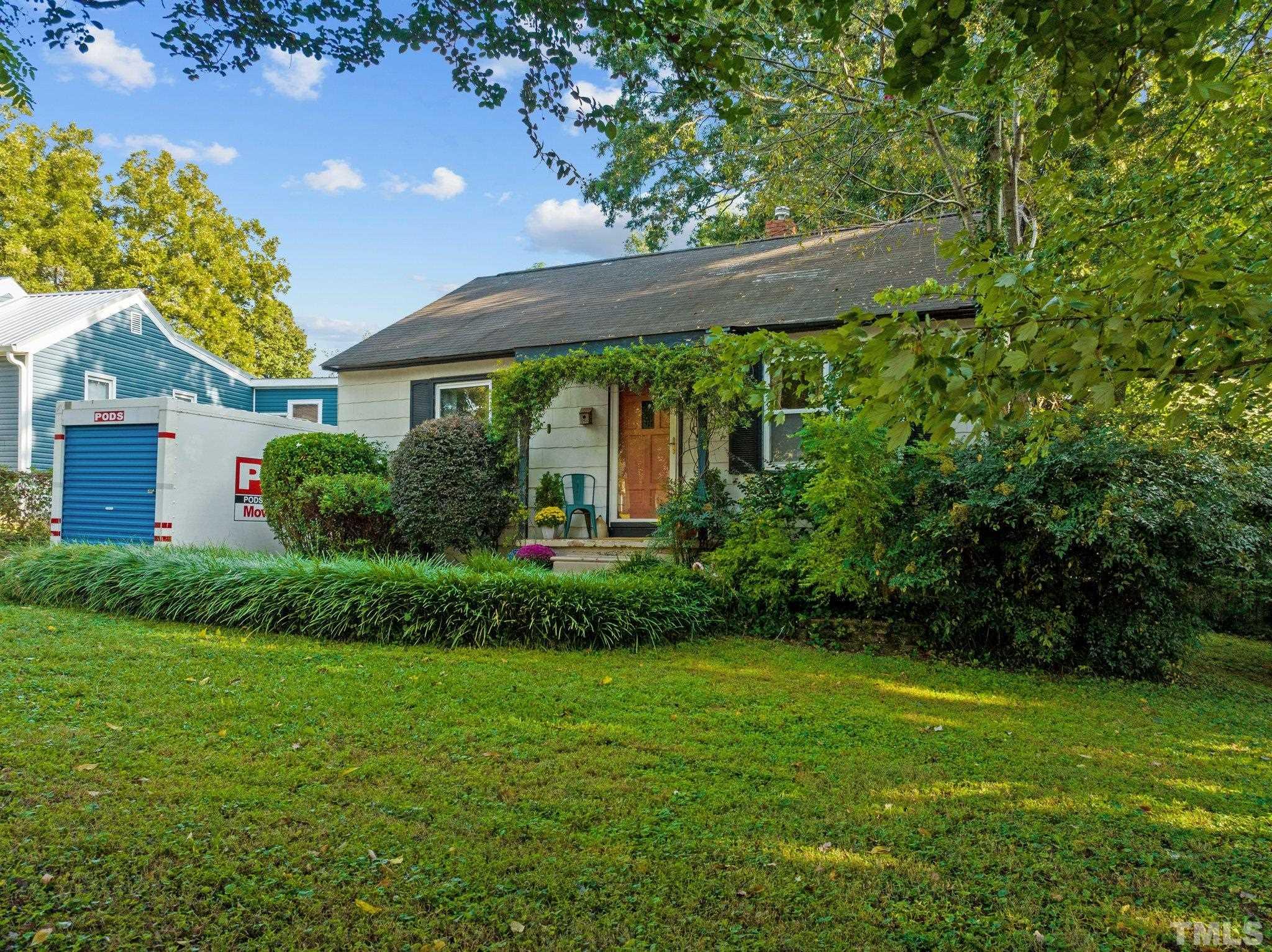 2615 Layden Street Raleigh, NC 27603 - Photo 3 of 34 a view of a house with garden and plants