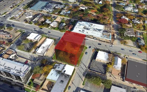 an aerial view of a highlighted house
