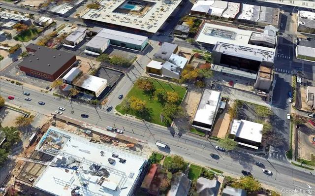 an aerial view of a house with a garden