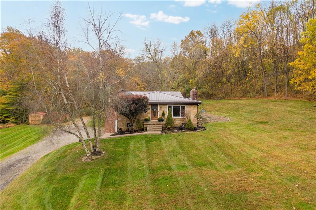 186 Gretna Road Washington, PA 15301 - Photo 1 of 48 a view of a swimming pool with a yard