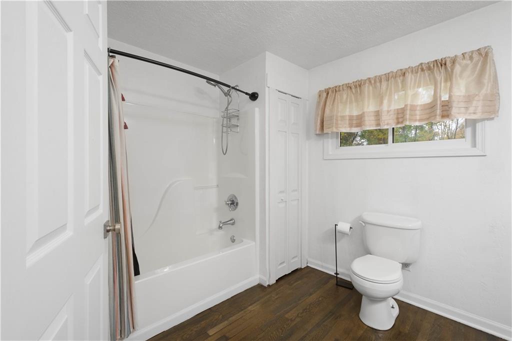 186 Gretna Road Washington, PA 15301 - Photo 12 of 48 a bathroom with a toilet and a shower
