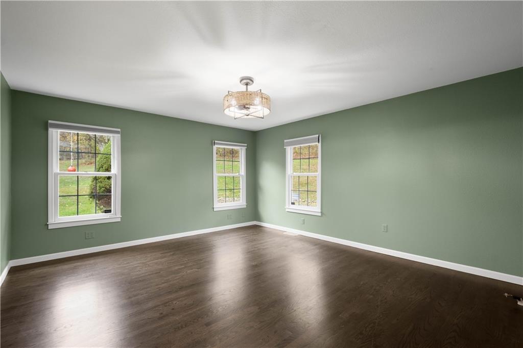 186 Gretna Road Washington, PA 15301 - Photo 14 of 48 an empty room with wooden floor and windows