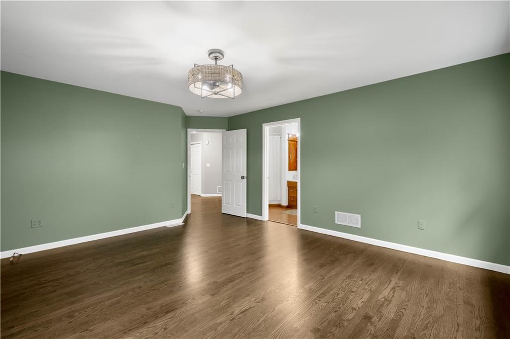 186 Gretna Road Washington, PA 15301 - Photo 15 of 48 an empty room with wooden floor and windows