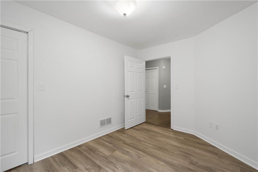 186 Gretna Road Washington, PA 15301 - Photo 18 of 48 a view of an empty room with wooden floor and closet