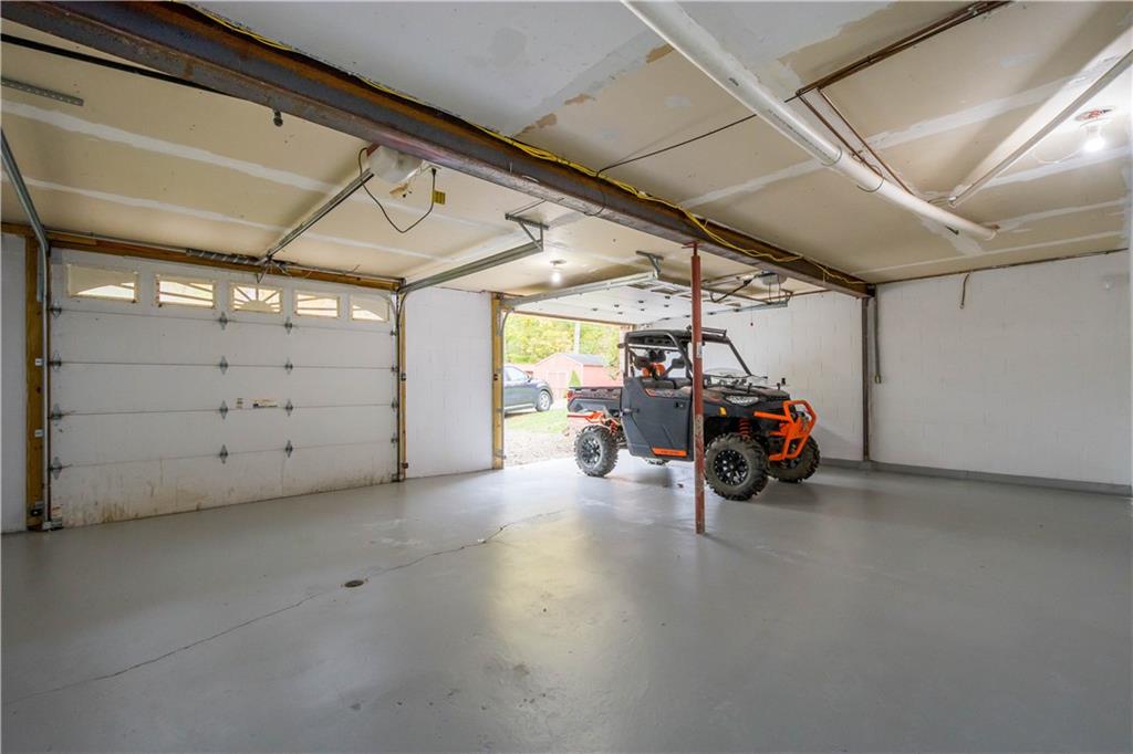 186 Gretna Road Washington, PA 15301 - Photo 26 of 48 a view of a garage with parked cars