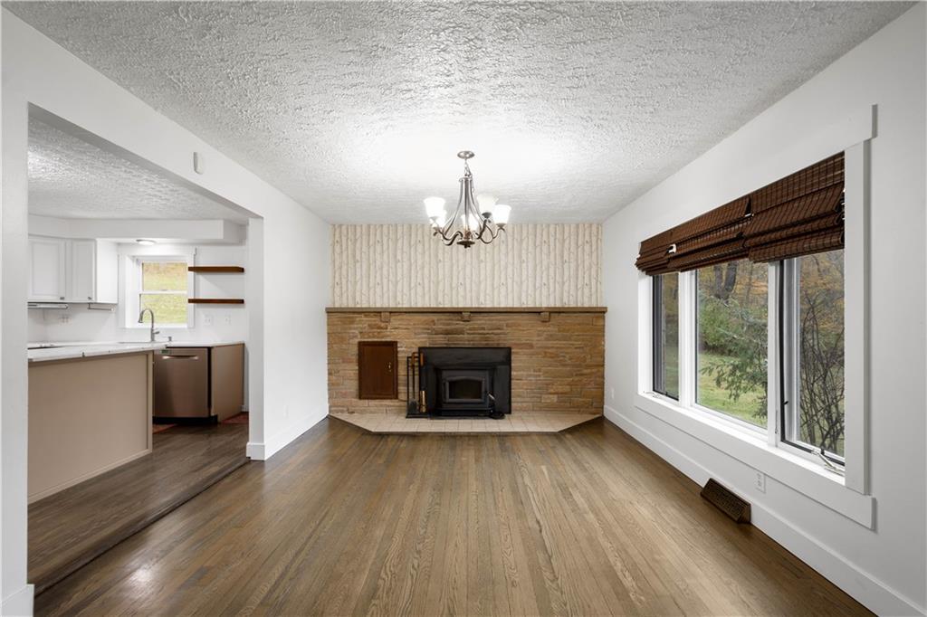 186 Gretna Road Washington, PA 15301 - Photo 3 of 48 wooden floor fireplace and windows in an empty room
