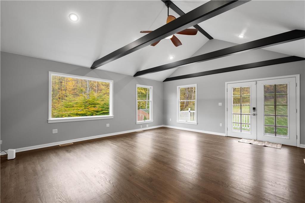 186 Gretna Road Washington, PA 15301 - Photo 9 of 48 an empty room with wooden floor and windows