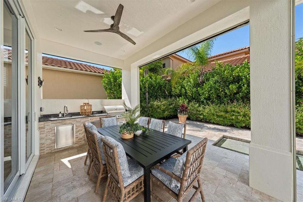 2139 Torino Way Naples, FL 34105 - Photo 23 of 24 a view of a dining room with furniture window and outside view
