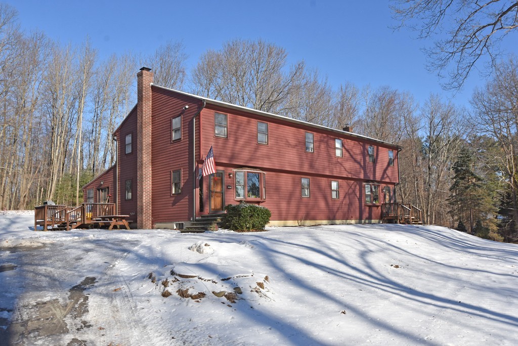46 Davis Road, Unit B Millbury, MA 01527 - Photo 14 of 18 a view of a building with a street view