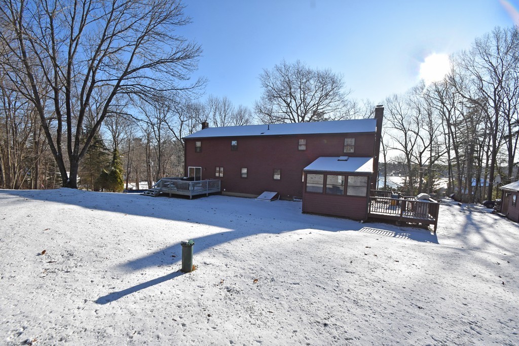 46 Davis Road, Unit B Millbury, MA 01527 - Photo 15 of 18 a street view covered with snow