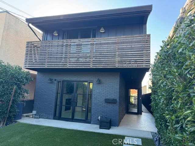 335 Flint Avenue Long Beach, CA 90814 - Photo 1 of 46 a front view of a house with plants