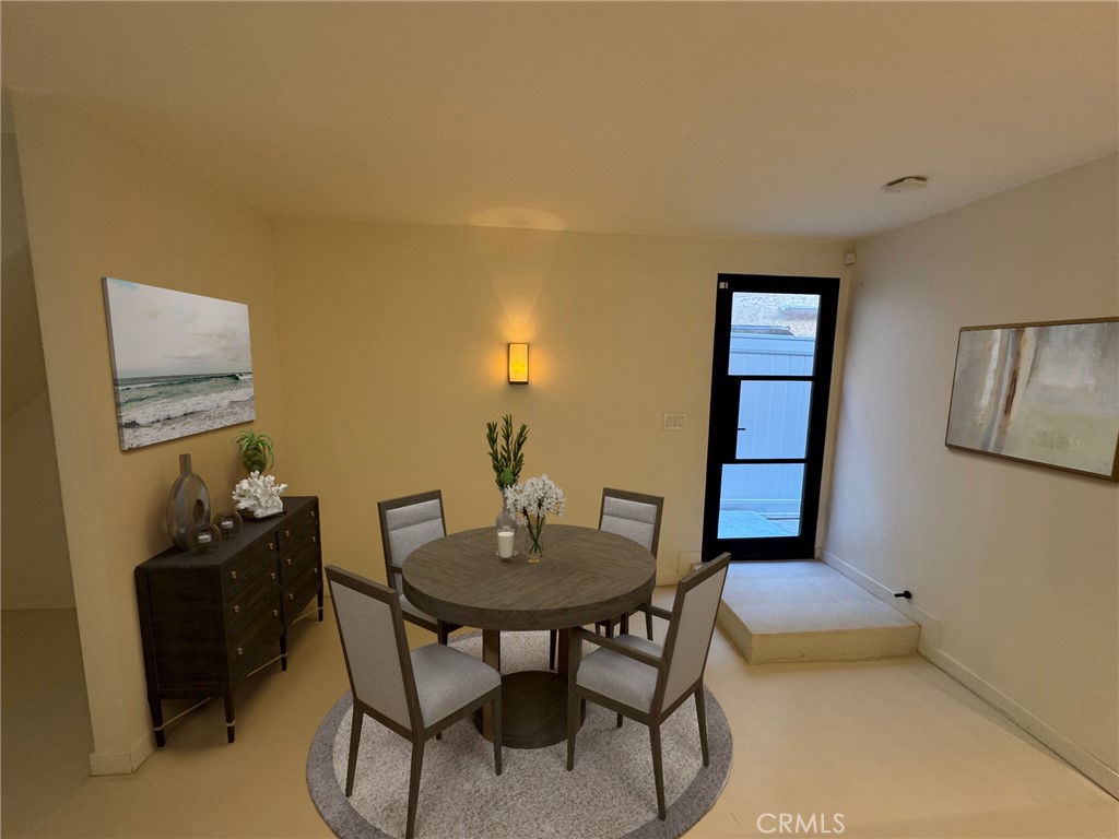 335 Flint Avenue Long Beach, CA 90814 - Photo 15 of 46 a view of a dining room with furniture and window