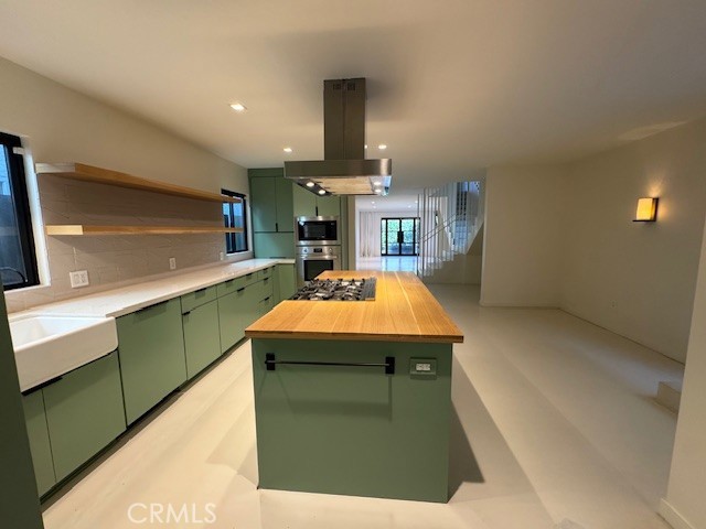 335 Flint Avenue Long Beach, CA 90814 - Photo 21 of 46 a kitchen with counter top space and stainless steel appliances