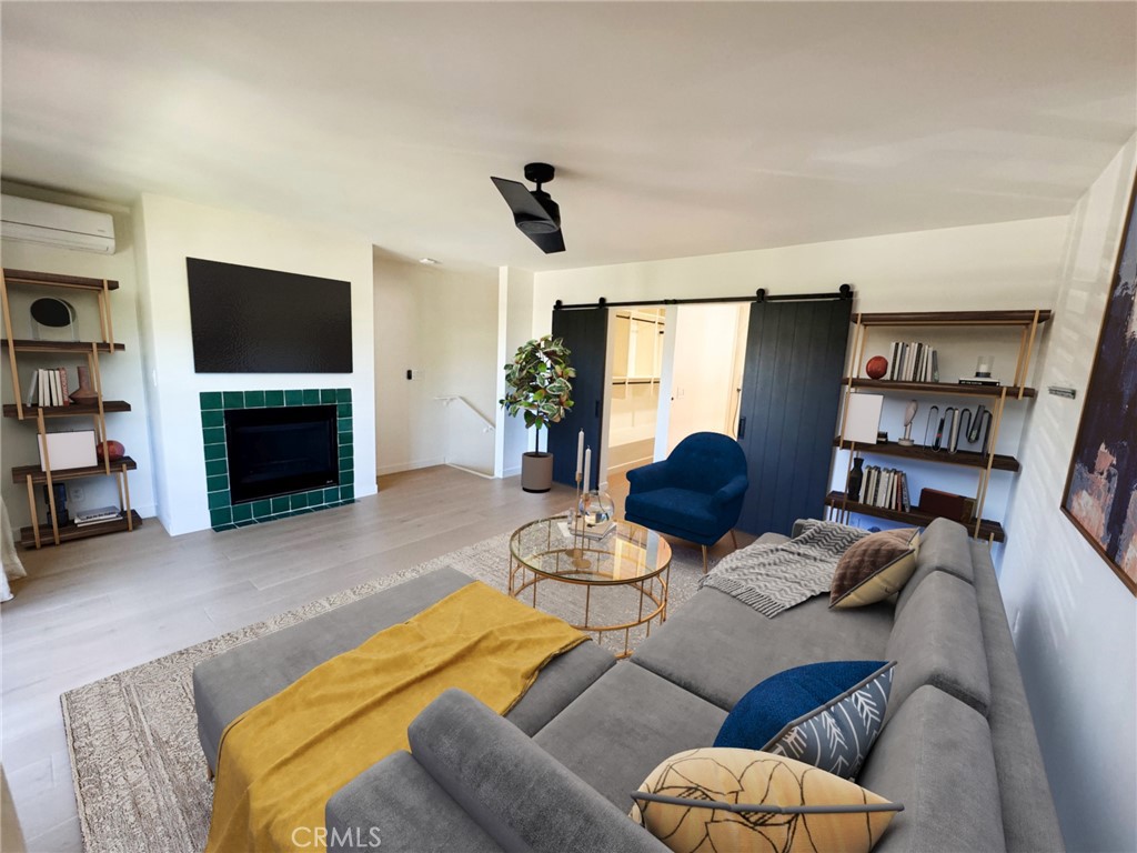335 Flint Avenue Long Beach, CA 90814 - Photo 28 of 46 a living room with furniture and a flat screen tv