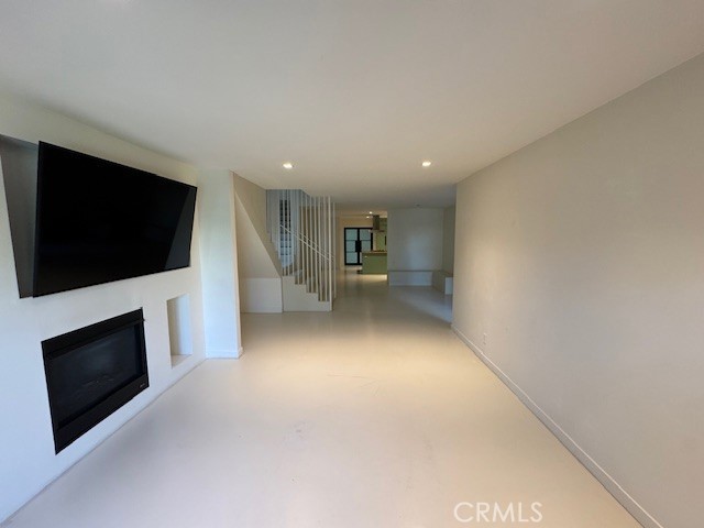 335 Flint Avenue Long Beach, CA 90814 - Photo 7 of 46 a view of a livingroom with a flat screen tv and washer