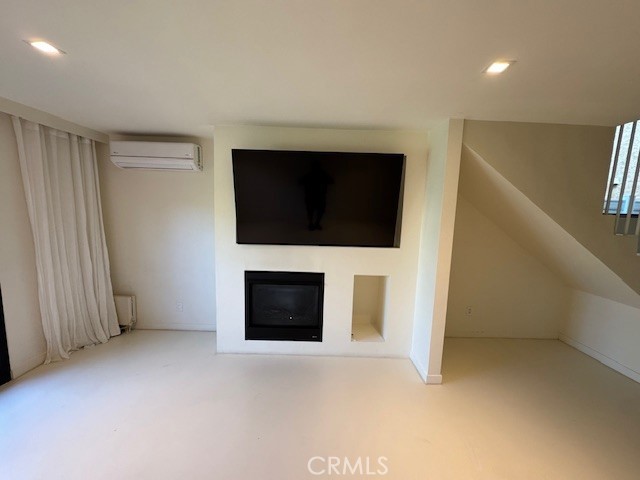 335 Flint Avenue Long Beach, CA 90814 - Photo 8 of 46 a view of an empty room with a fireplace and a window
