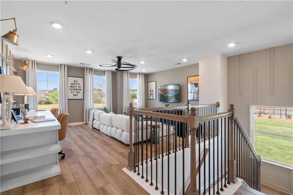 420 Hartsfield Road McDonough, GA 30252 - Photo 29 of 45 a bedroom with furniture and a large window