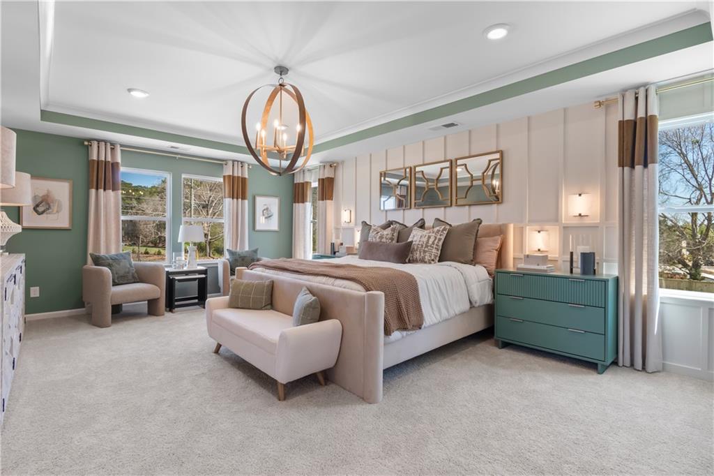 420 Hartsfield Road McDonough, GA 30252 - Photo 37 of 45 a spacious bedroom with bed and a large window