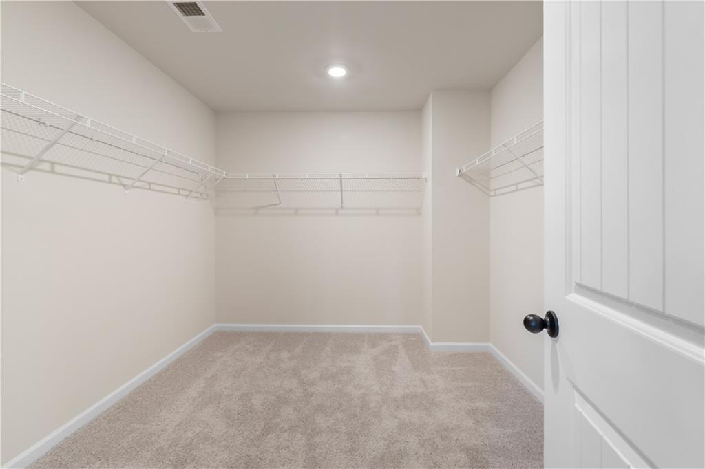 420 Hartsfield Road McDonough, GA 30252 - Photo 45 of 45 a view of a room with racks on the wall