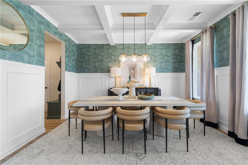 420 Hartsfield Road McDonough, GA 30252 - Photo 6 of 45 a room with a table and chairs