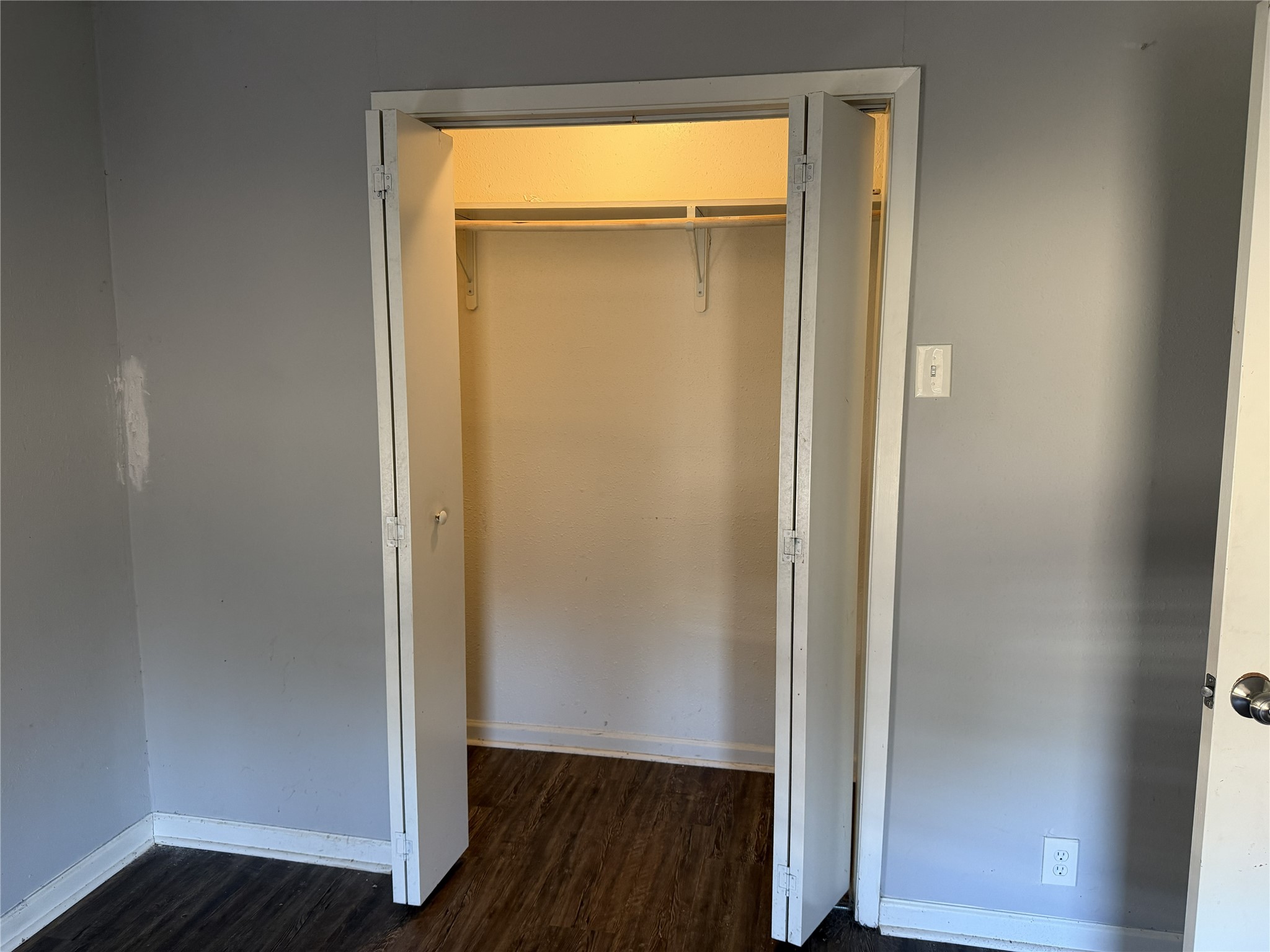 2409 Hodges Street Baytown, TX 77521 - Photo 19 of 29 a view of front door with wooden floor