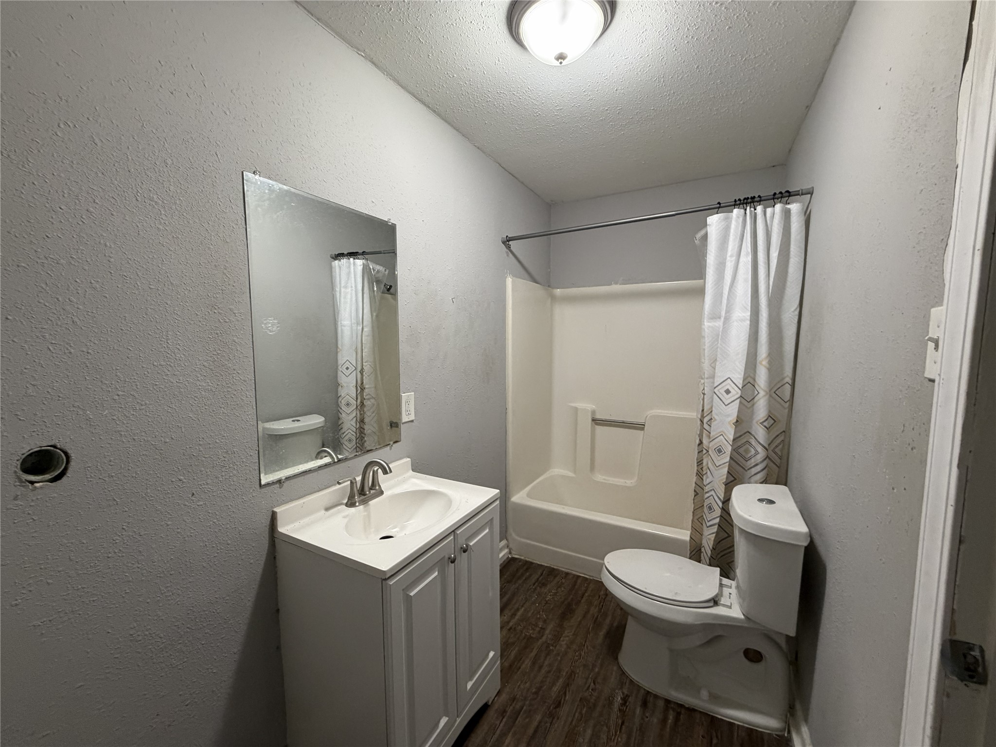2409 Hodges Street Baytown, TX 77521 - Photo 20 of 29 a bathroom with a sink a toilet and shower
