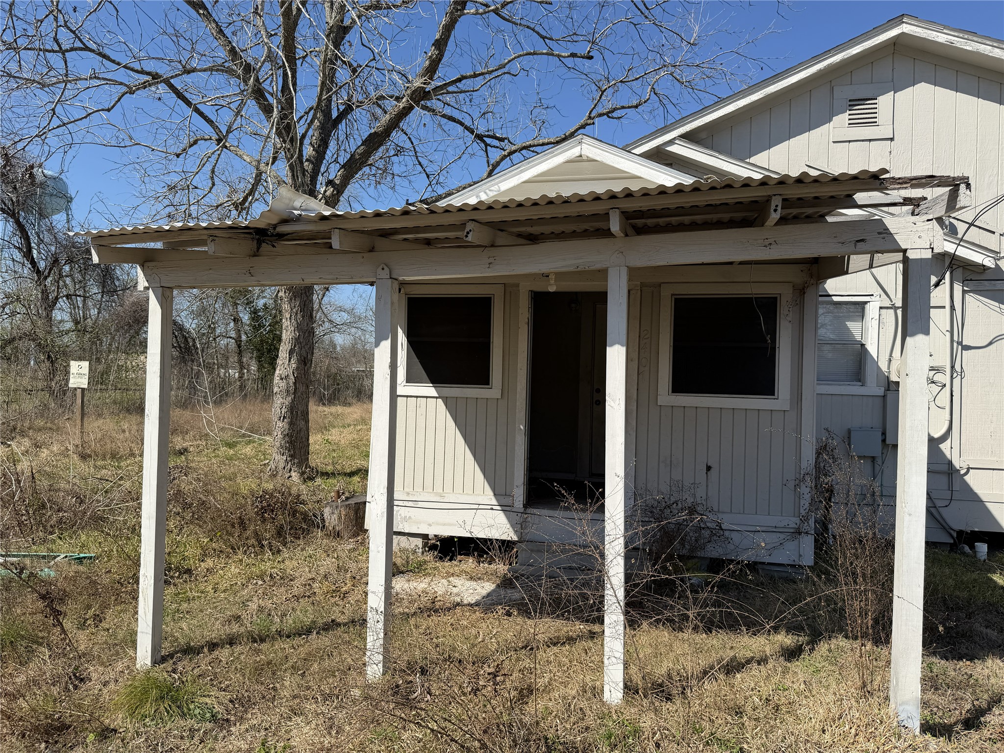 2409 Hodges Street Baytown, TX 77521 - Photo 21 of 29 a view of a house with a porch