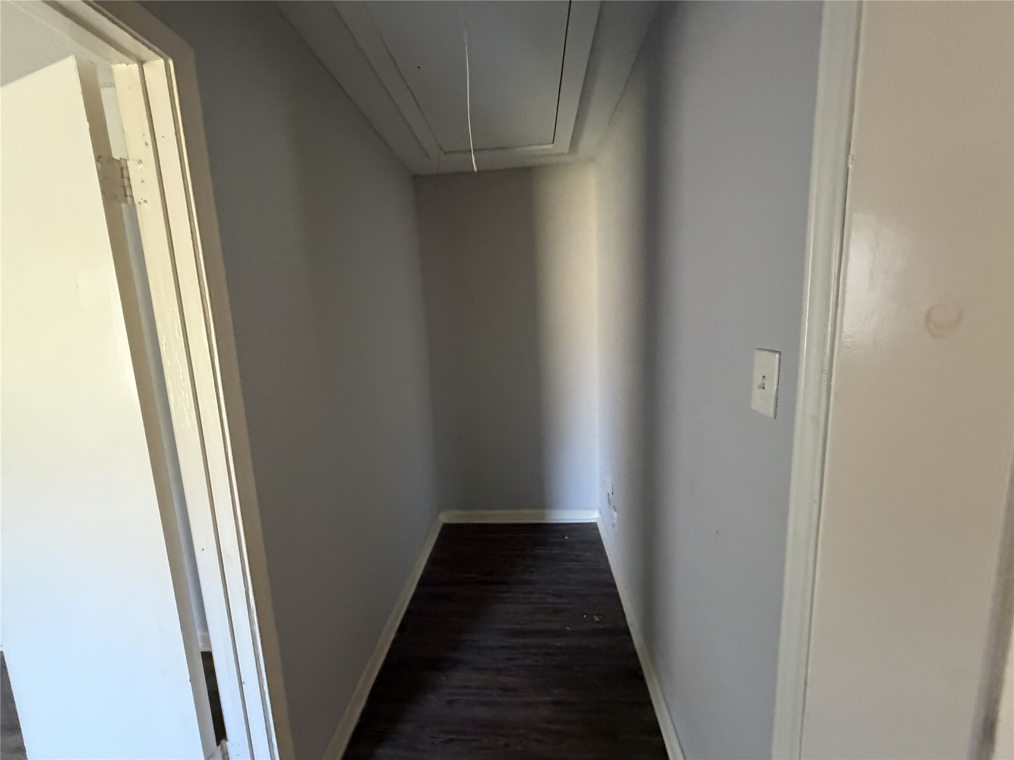 2409 Hodges Street Baytown, TX 77521 - Photo 23 of 29 a view of a hallway with a window