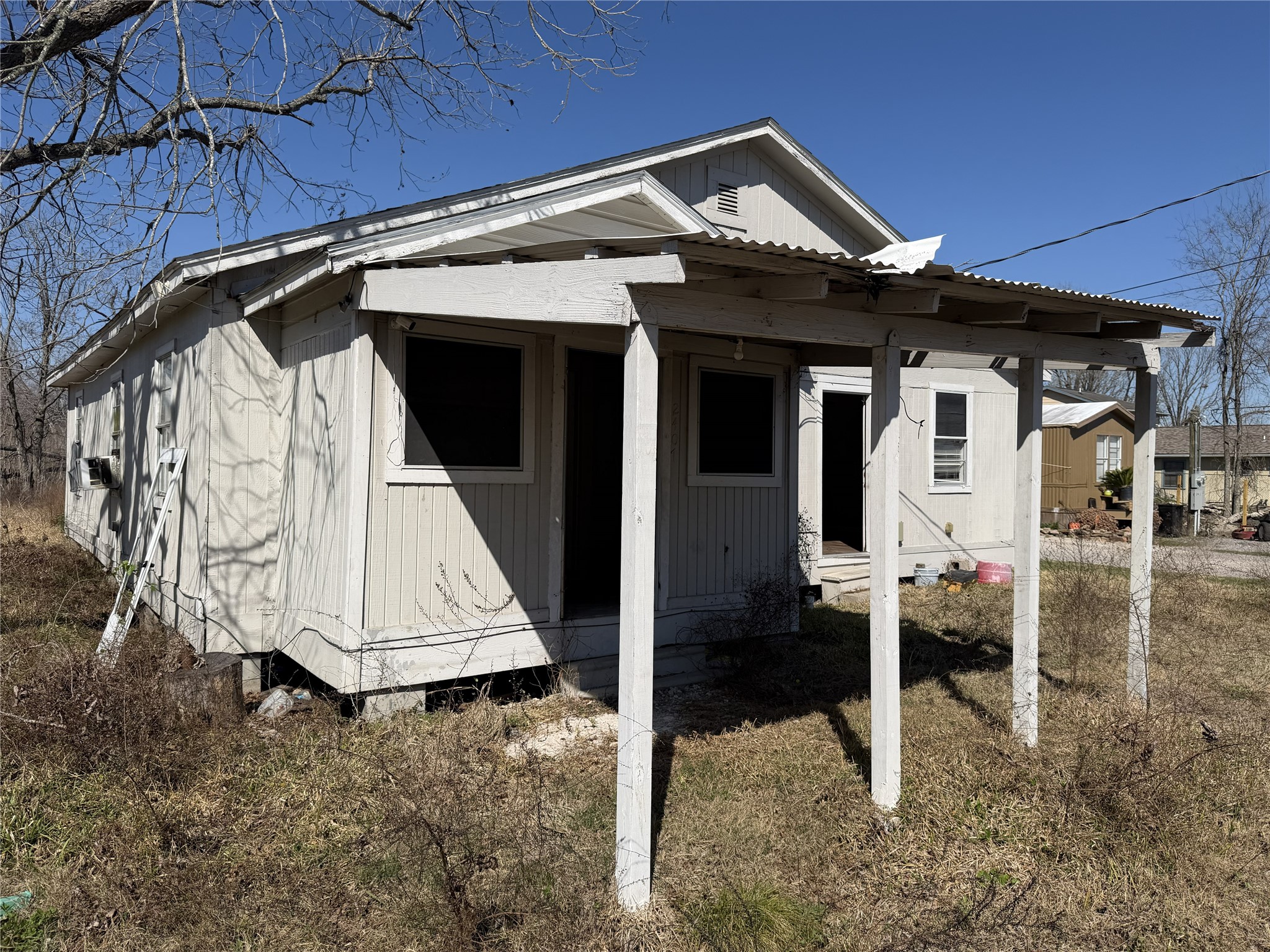 2409 Hodges Street Baytown, TX 77521 - Photo 28 of 29 a view of a house with wooden walls