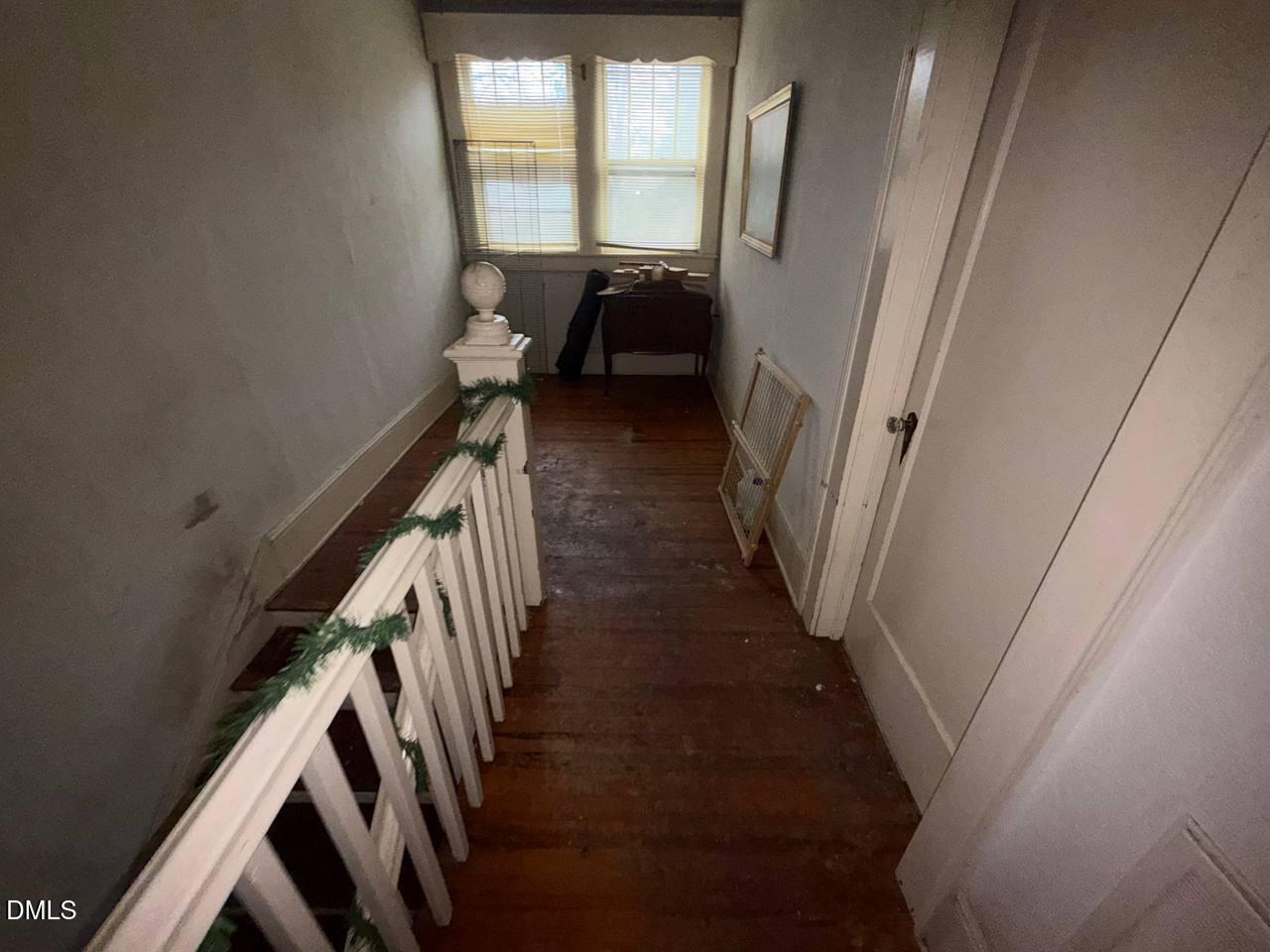 414 Raleigh Road Oxford, NC 27565 - Photo 14 of 24 a view of entryway and hall with wooden floor