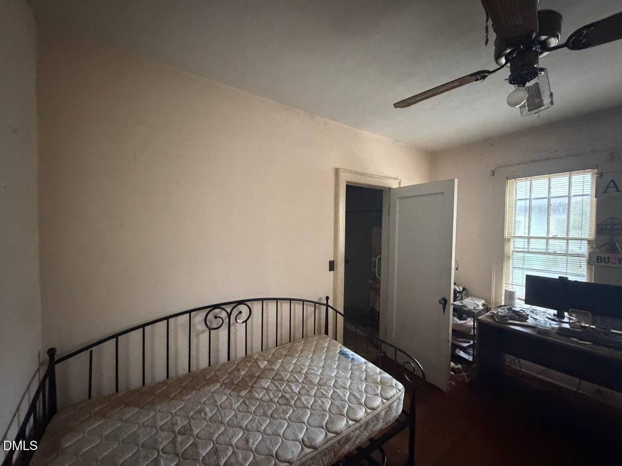 414 Raleigh Road Oxford, NC 27565 - Photo 17 of 24 a view of a hallway to a livingroom with furniture