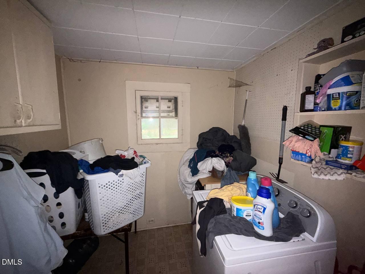 414 Raleigh Road Oxford, NC 27565 - Photo 18 of 24 a living room with furniture and a window